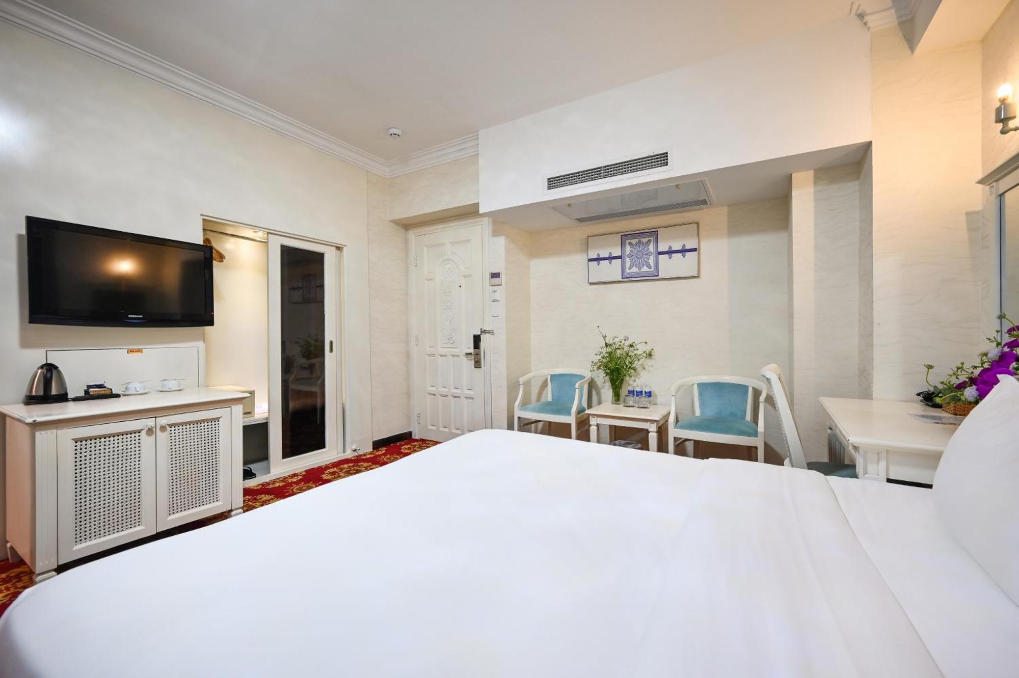 California Saigon Hotel & Rooftop Pool Πόλη Χο Τσι Μινχ Δωμάτιο φωτογραφία