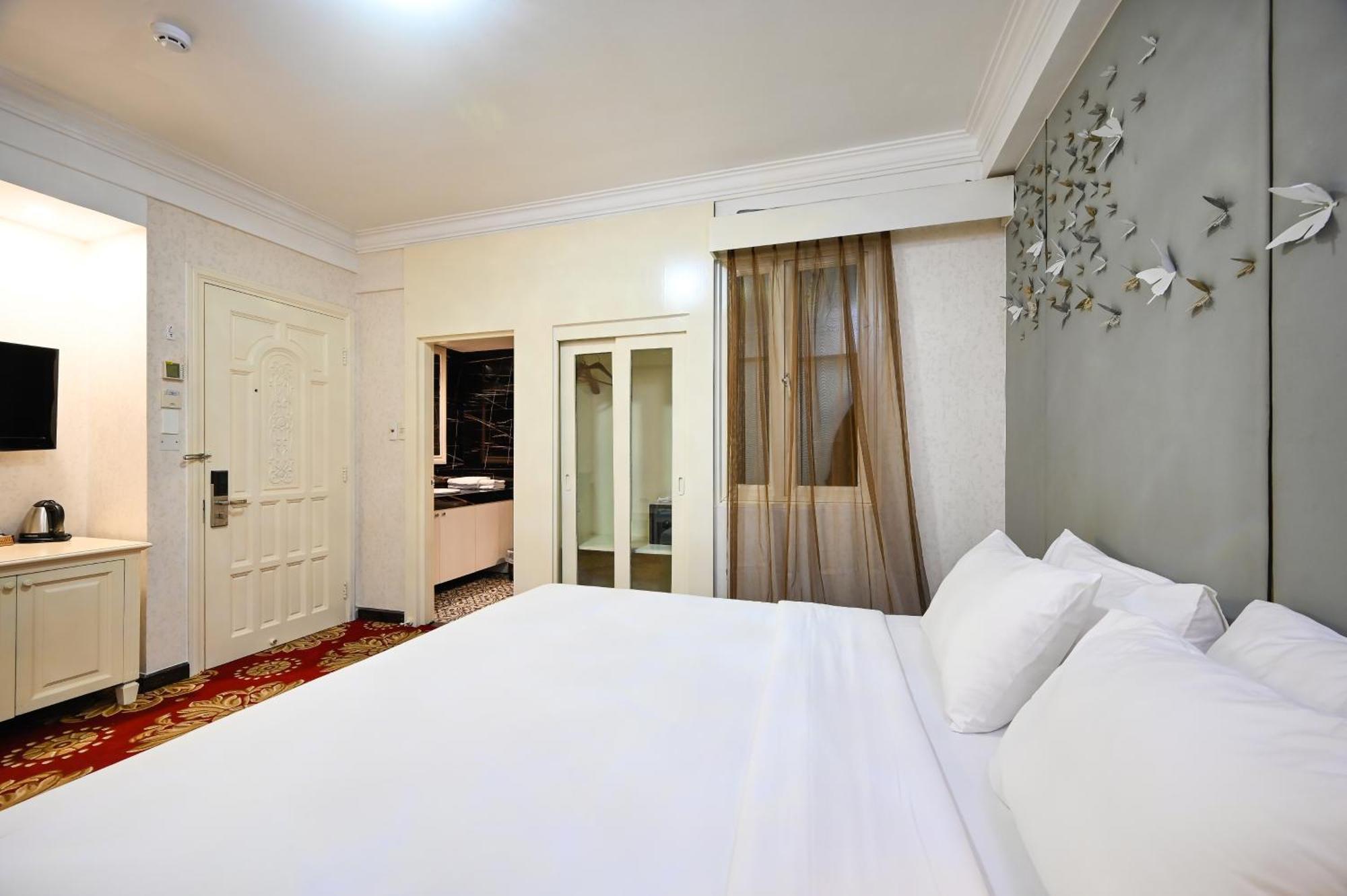 California Saigon Hotel & Rooftop Pool Πόλη Χο Τσι Μινχ Δωμάτιο φωτογραφία